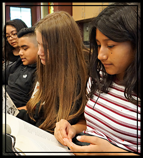 4 students reading books